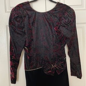 Black velveteen long sleeve, evening dress with gold trim. Size 6.